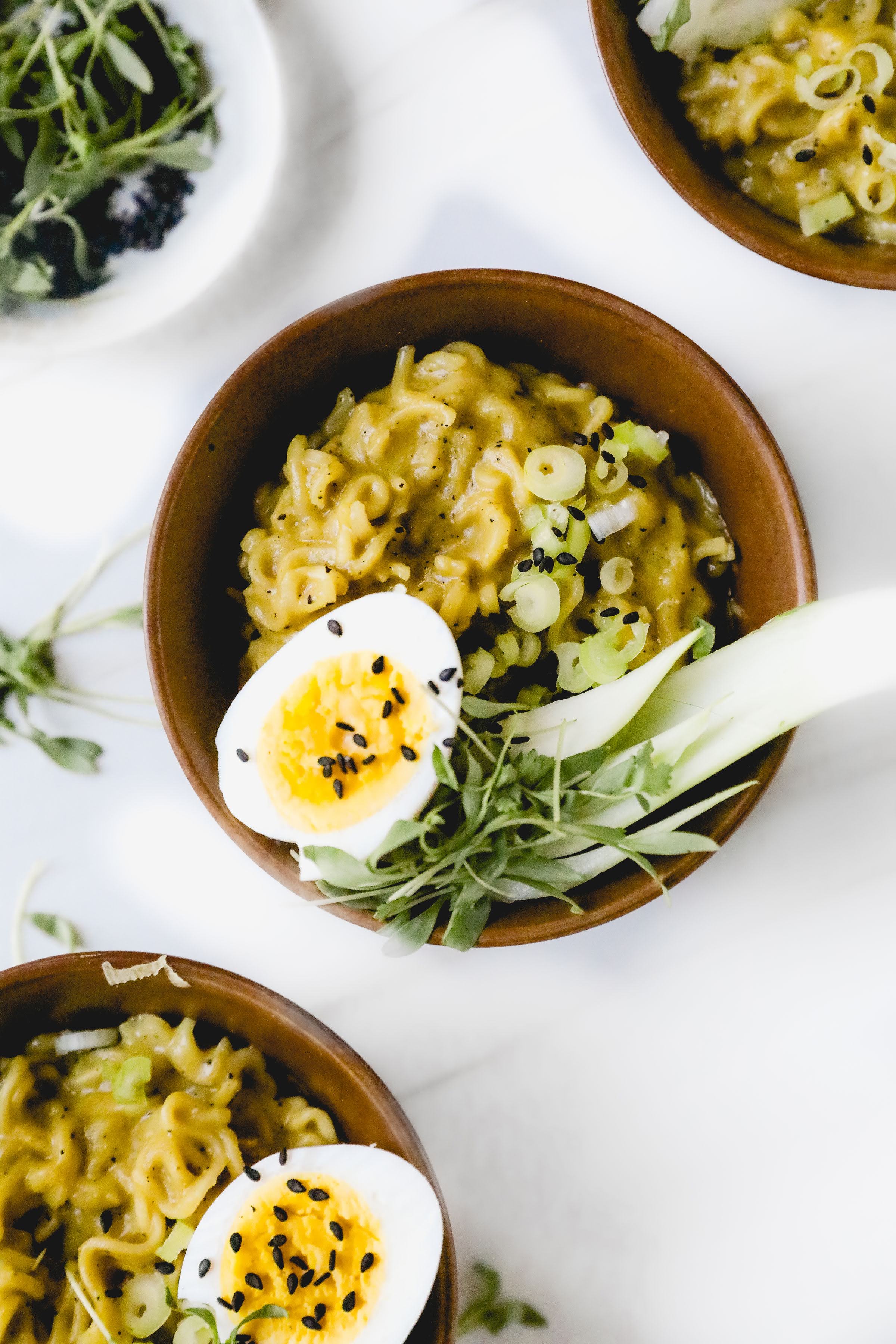 top view of ramen bowl with scallion and egg