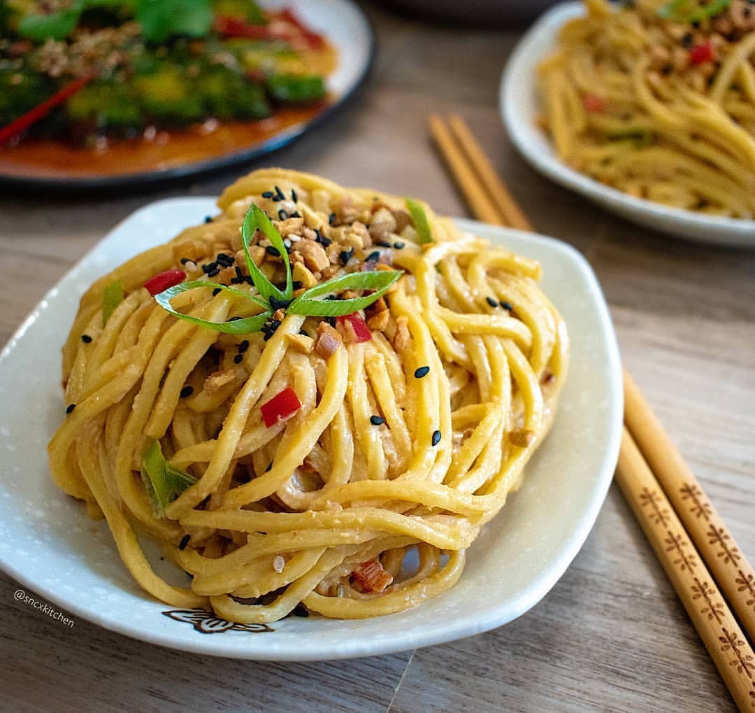 A close-up shot of a plate of Cold (or Warm) Sesame Noodle Salad made with JOI plant bases.