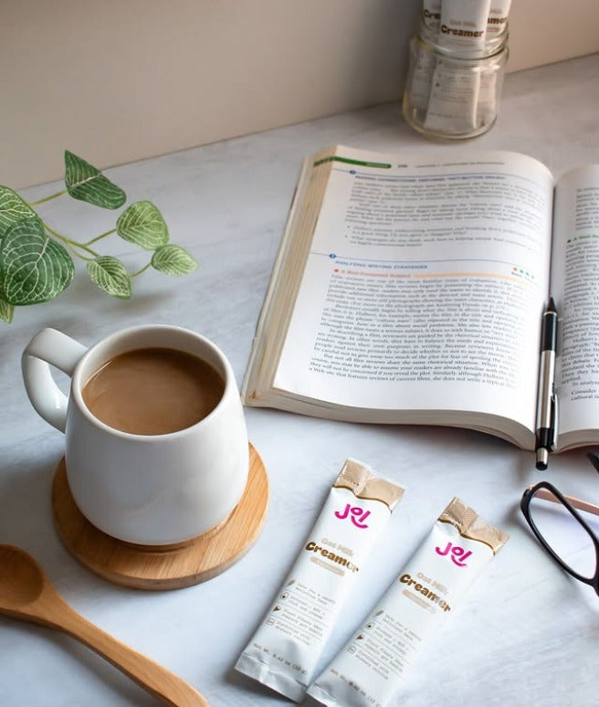 Morning coffee made with JOI plant-based, dairy-free oat milk creamer with 2 sachets for a healthy, flavorful cup.
