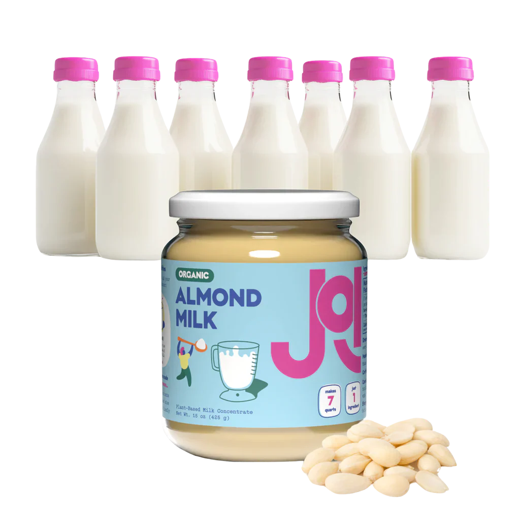  JOI almond milk base that can make seven quarts of plant-based milk, with almonds beside it and eco-friendly packaging.
