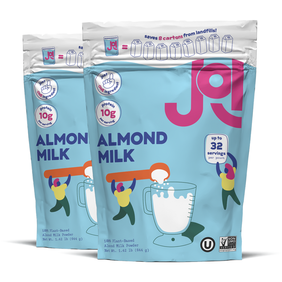 Two packages of JOI Almond Milk on a white background