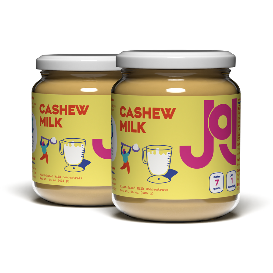 Two jars of JOI Cashew Milk on a white background