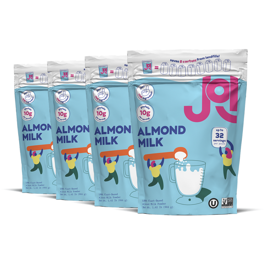 Four packages of JOI Almond Milk on a white background