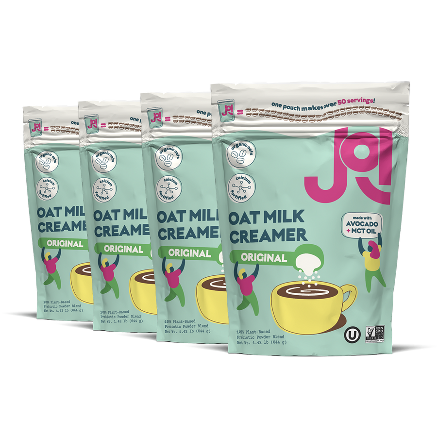 Five packages of JOI Oat Milk Creamer on a white background