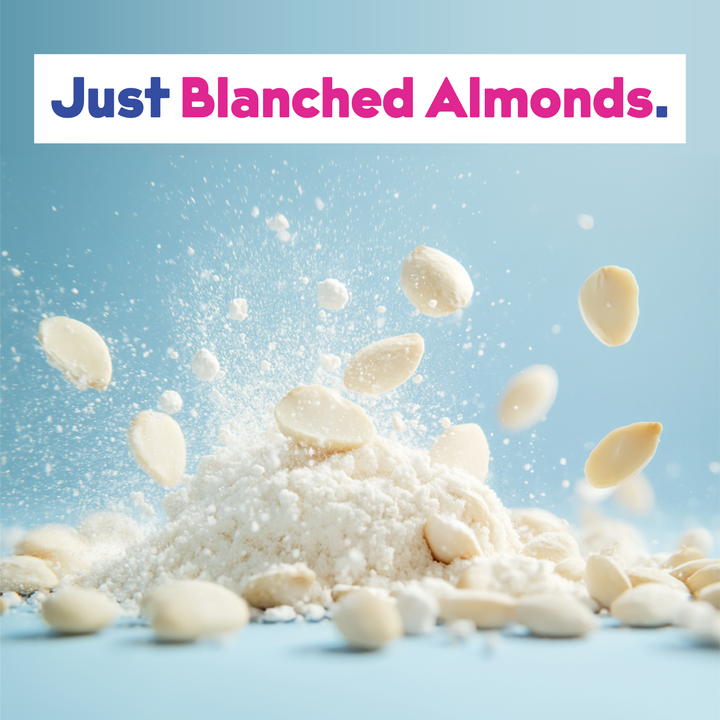 JOI Almond Milk Powder, made from just blanched California almonds, with a pile of white powder and whole almonds.