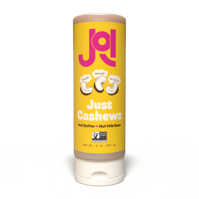 A yellow JOI Cashew Base tube, promoting a 