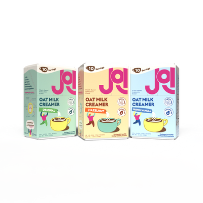 Three oat milk creamer cartons in original, hazelnut, and French vanilla varieties