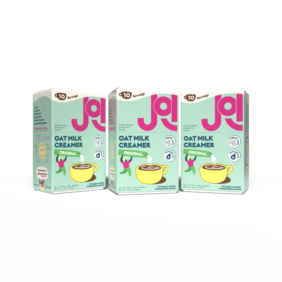Three JOI Original Oat Milk Creamer boxes displayed side by side, featuring plant-based prebiotic blend with organic oats & avocado oil, and landfill biodegradable packaging.