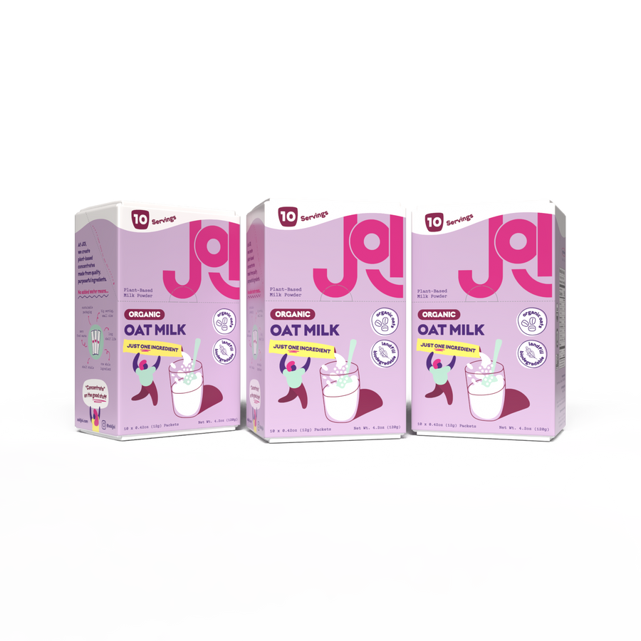 Three JOI Organic Oat Milk boxes displayed side by side, featuring “Just One Ingredient,” organic oats, and plant-based oat milk powder packaging.
