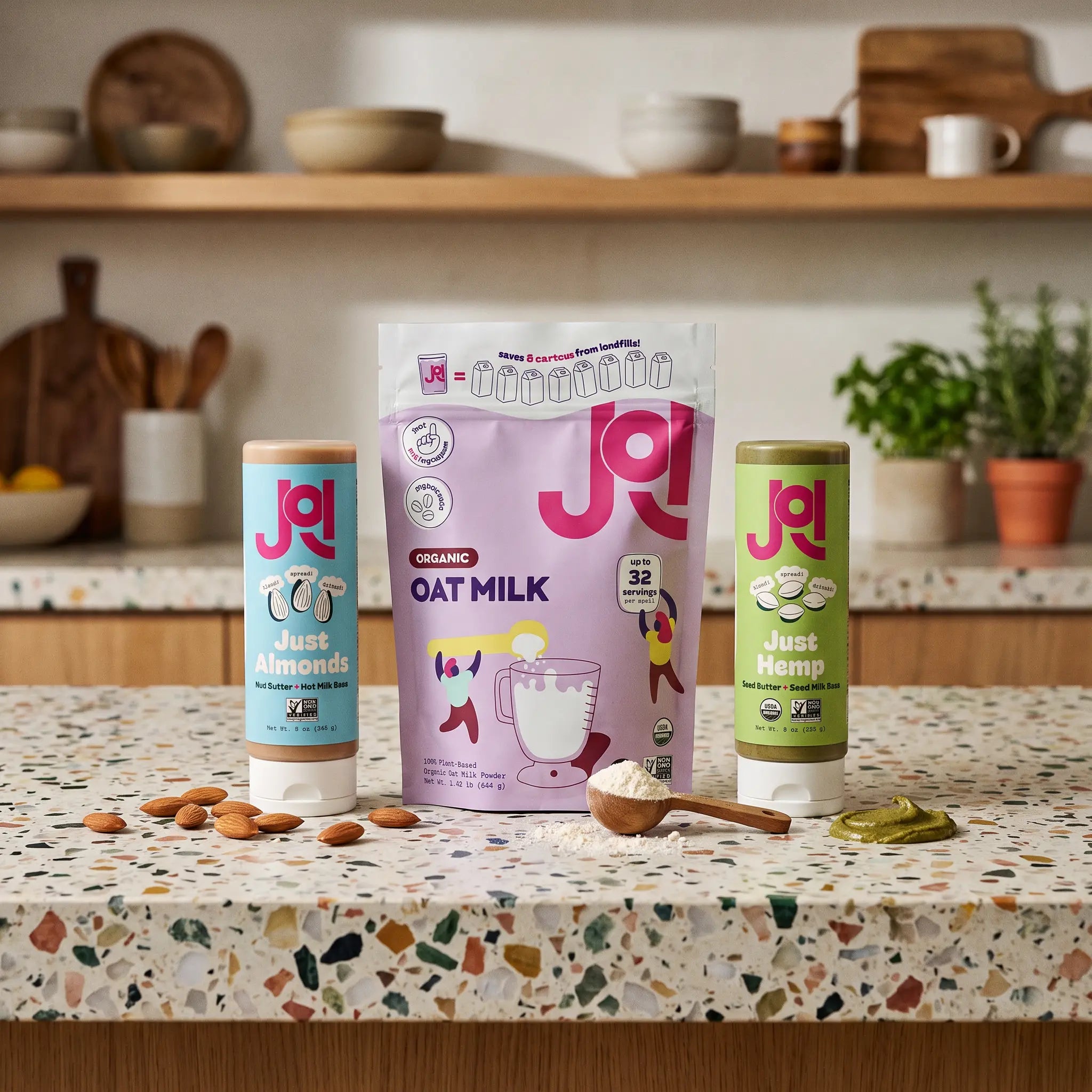 JOI plant bases including Just Almonds, Just Hemp, and Organic Oat Milk are displayed on a kitchen counter.
