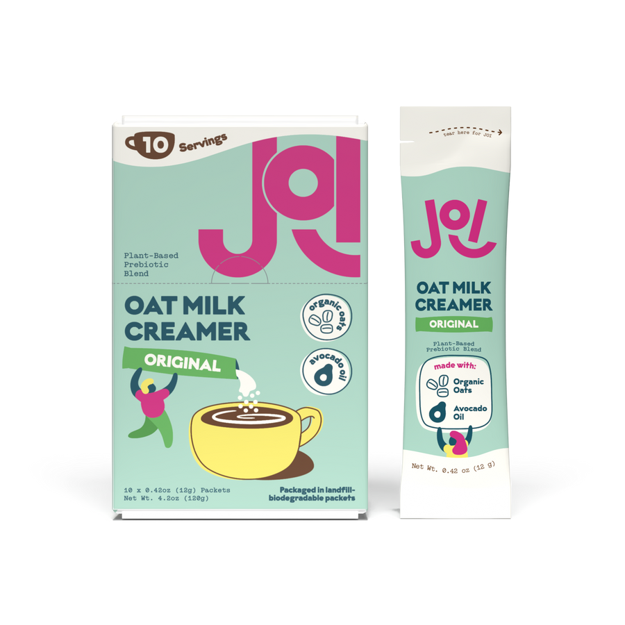 JOI Original Oat Milk Creamer box with single-serve stick pack beside it, featuring plant-based prebiotic blend, organic oats, avocado oil, and coffee creamer packaging.