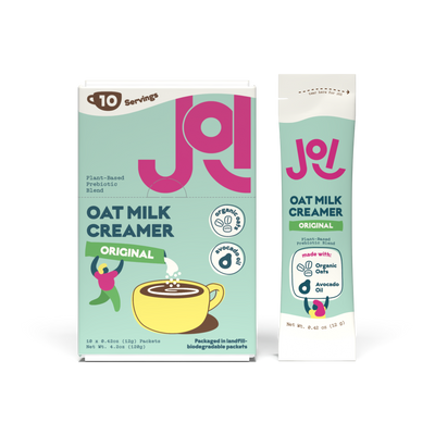JOI Original Oat Milk Creamer box with single-serve stick pack beside it, featuring plant-based prebiotic blend, organic oats, avocado oil, and coffee creamer packaging.