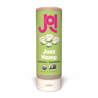 A tall JOI Organic Hemp Base squeeze pouch with a green label featuring 