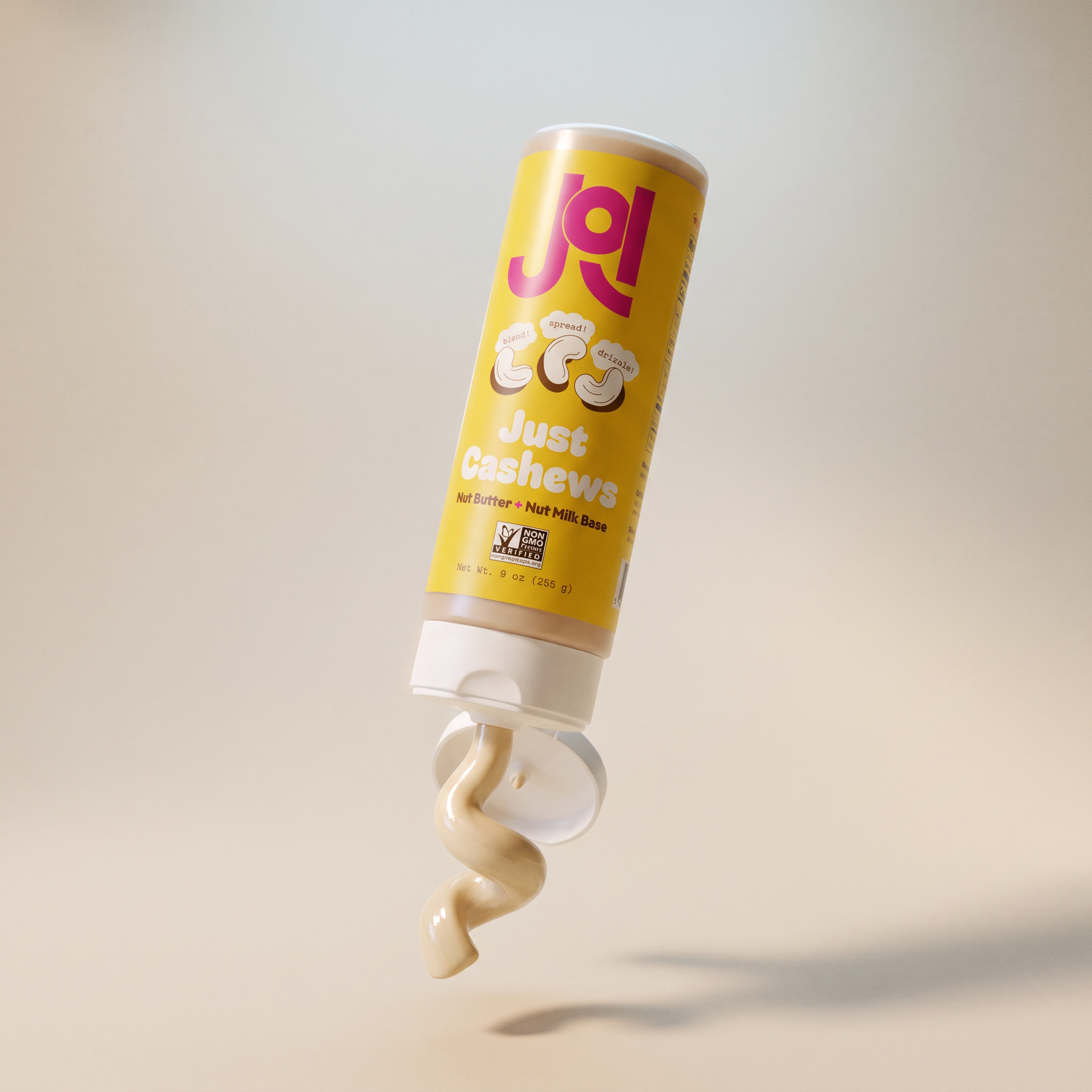 JOI Cashew Base squeezed from a yellow tube reveals its creamy texture, with text 