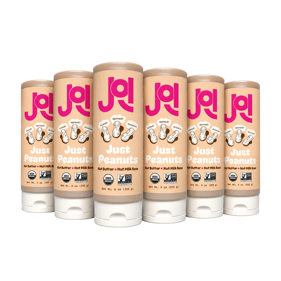 Six squeezable tubes of JOI Organic Peanut Base are shown, featuring "Just Peanuts" and USDA Organic certifications.