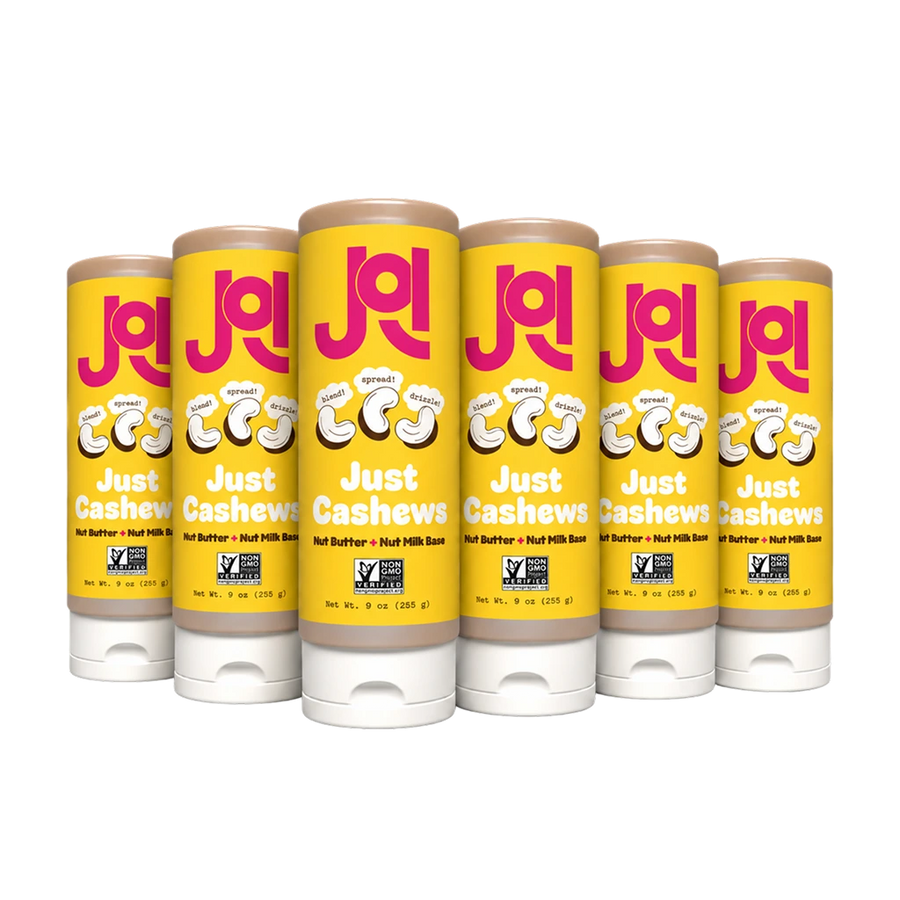 Six JOI Cashew Base 9 oz squeeze pouches are lined up, featuring "Just Cashews" and "Non-GMO Project Verified" seals.