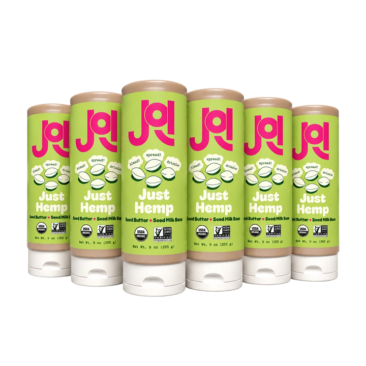 Six JOI Organic Hemp Plant Bases in easy-squeeze green tubes, with "Just Hemp" text and USDA Organic certifications.